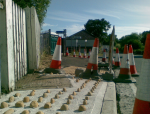 New kerbs and raised pavement under construction at Darsham Station