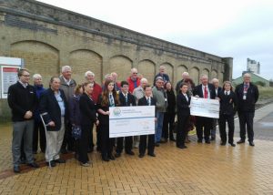 Members of Enterprise Lowestoft, officials from Suffolk County Council, Waveney District Council, Abellio Greater Anglia, and Network Rail join students in a cheque presentation ceremony to officially launch the Lowestoft Station Arches scheme 16 September 2015