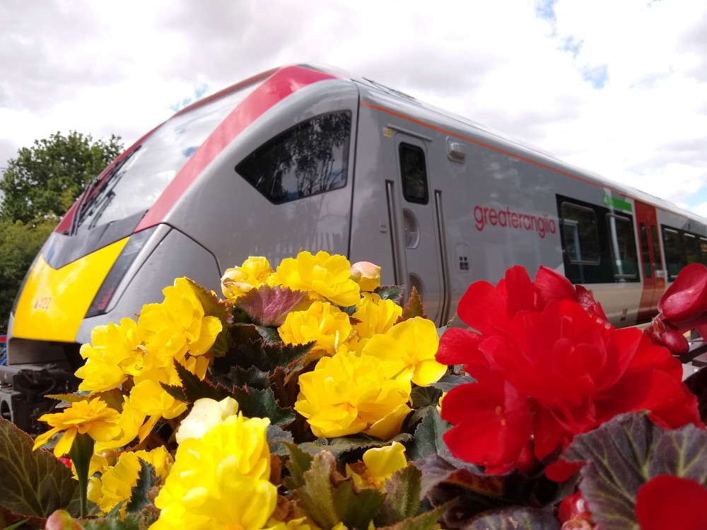 Greater Anglia train and Brampton station flowers 5 August 2022