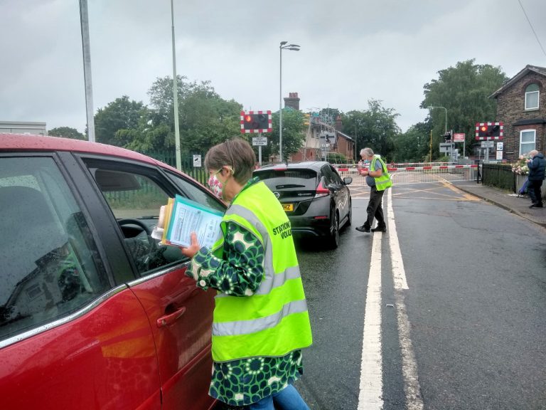Sandy Burn and the station adopters handing out leaflets when the campaign first started June 2021