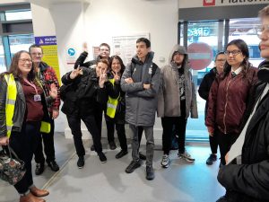 Young people and adults at Ipswich station taking part in the Travel Training Service