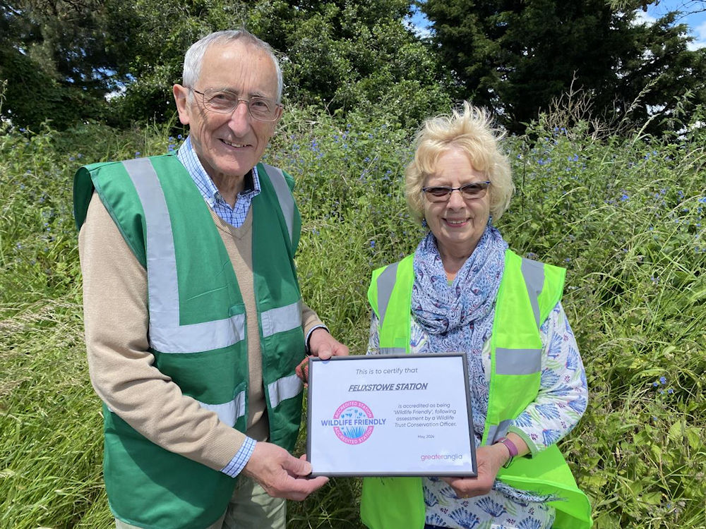 Oulton Broad North Station Adopters receive their Wild Friendly Accreditation Certificate