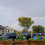 Newly installed flowers and a rainbow over Saxmundham Station Station 20 October 2025